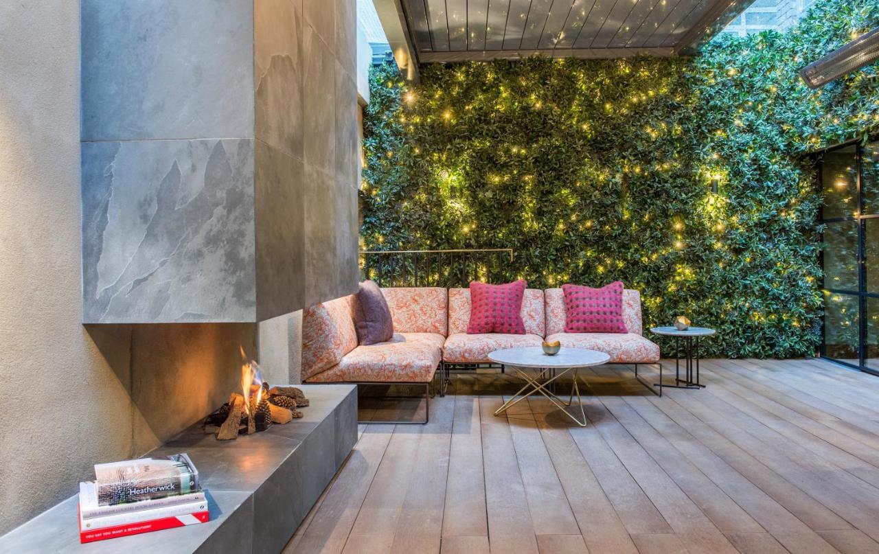 فندق ذا ماريليبون لندن المظهر الخارجي الصورة Living room with a fireplace