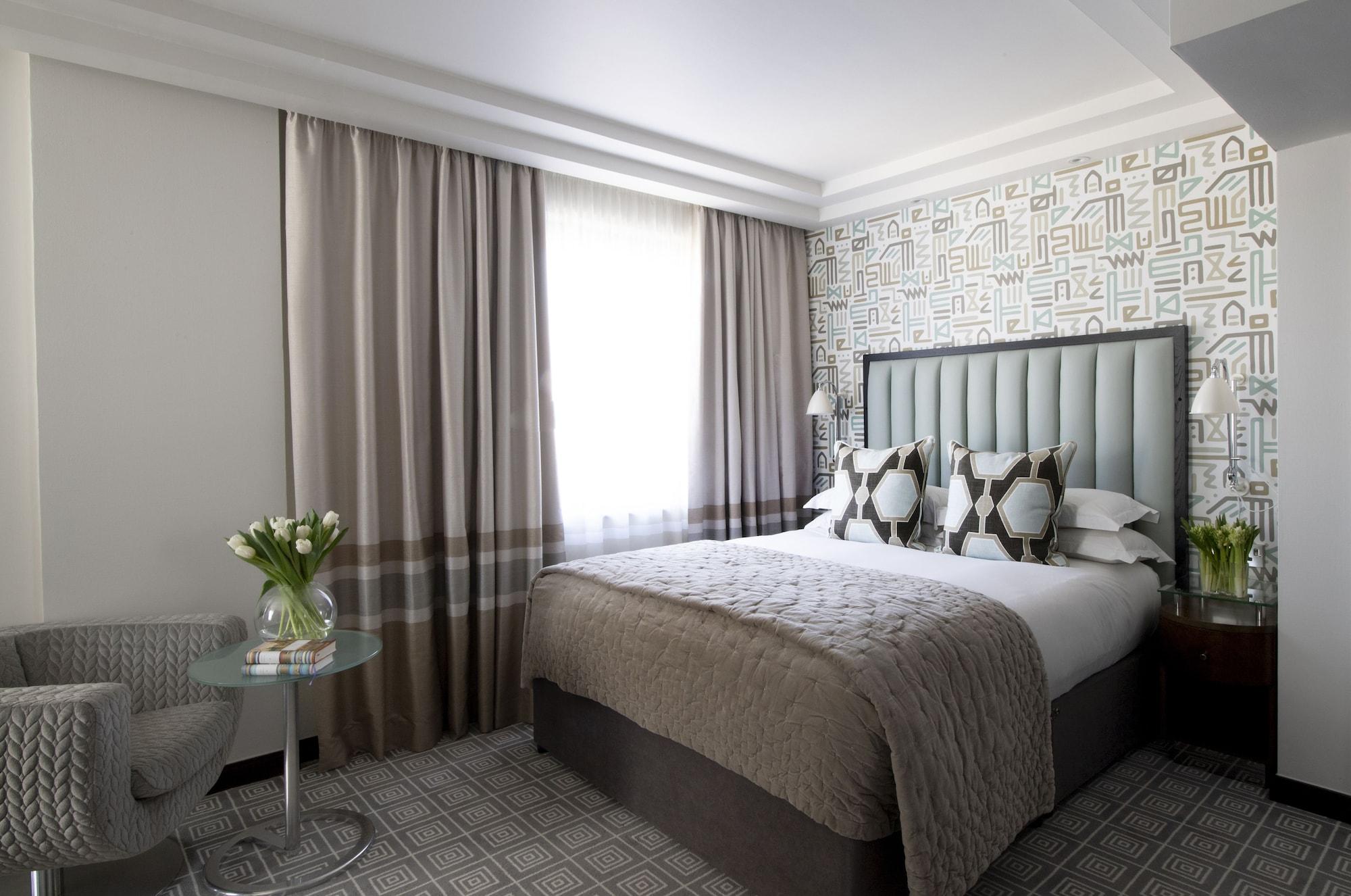 فندق ذا ماريليبون لندن المظهر الخارجي الصورة A bedroom at the hotel