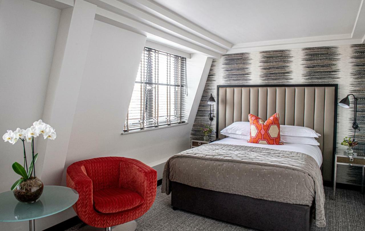 فندق ذا ماريليبون لندن المظهر الخارجي الصورة A bedroom at the hotel